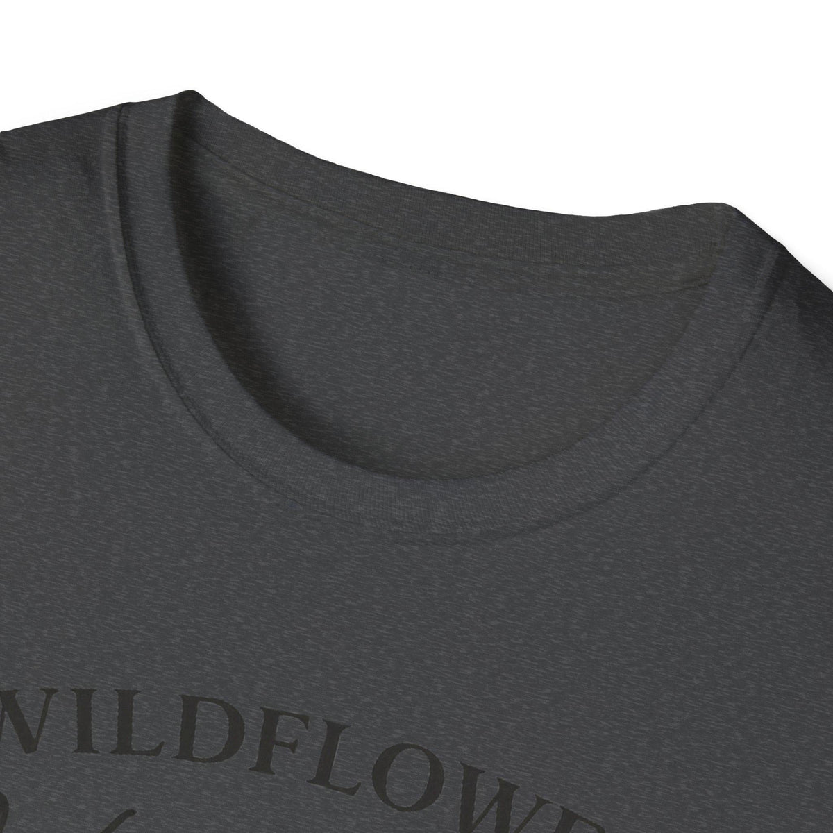 A close-up of the dark gray t-shirt's neckline and shoulder, showing the fabric texture.