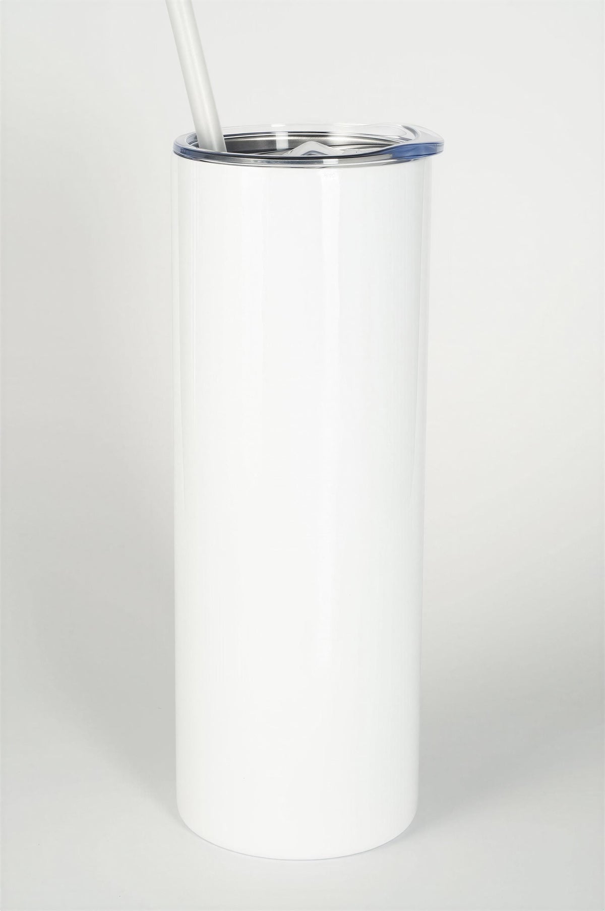 A white cylindrical container with a lid, featuring a straw sticking out of it.